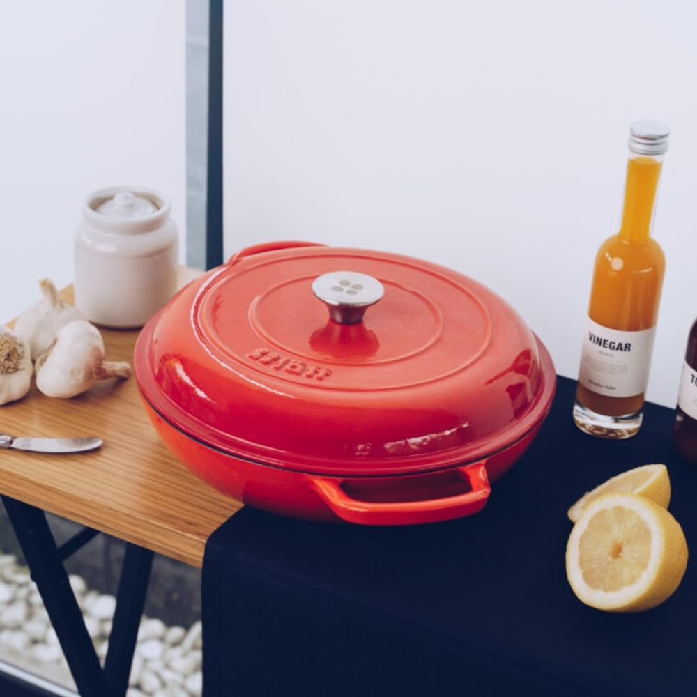 Cocotte en fonte émaillée orange. Cocotte ronde 26 x 12 cm - 4,8 l. Marmite élégante, résistante, spéciale à induction et adaptée à tous types de cuisines