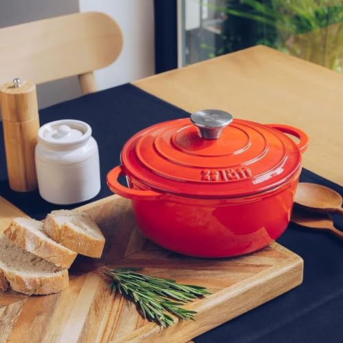 Cocotte en fonte émaillée orange. Cocotte ronde 26 x 12 cm - 4,8 l. Marmite élégante, résistante, spéciale à induction et adaptée à tous types de cuisines