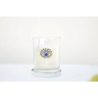 Bougie argent œil parfum patchouli AULICA