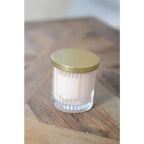 Bougie rose avec couvercle doré parfum coco AULICA
